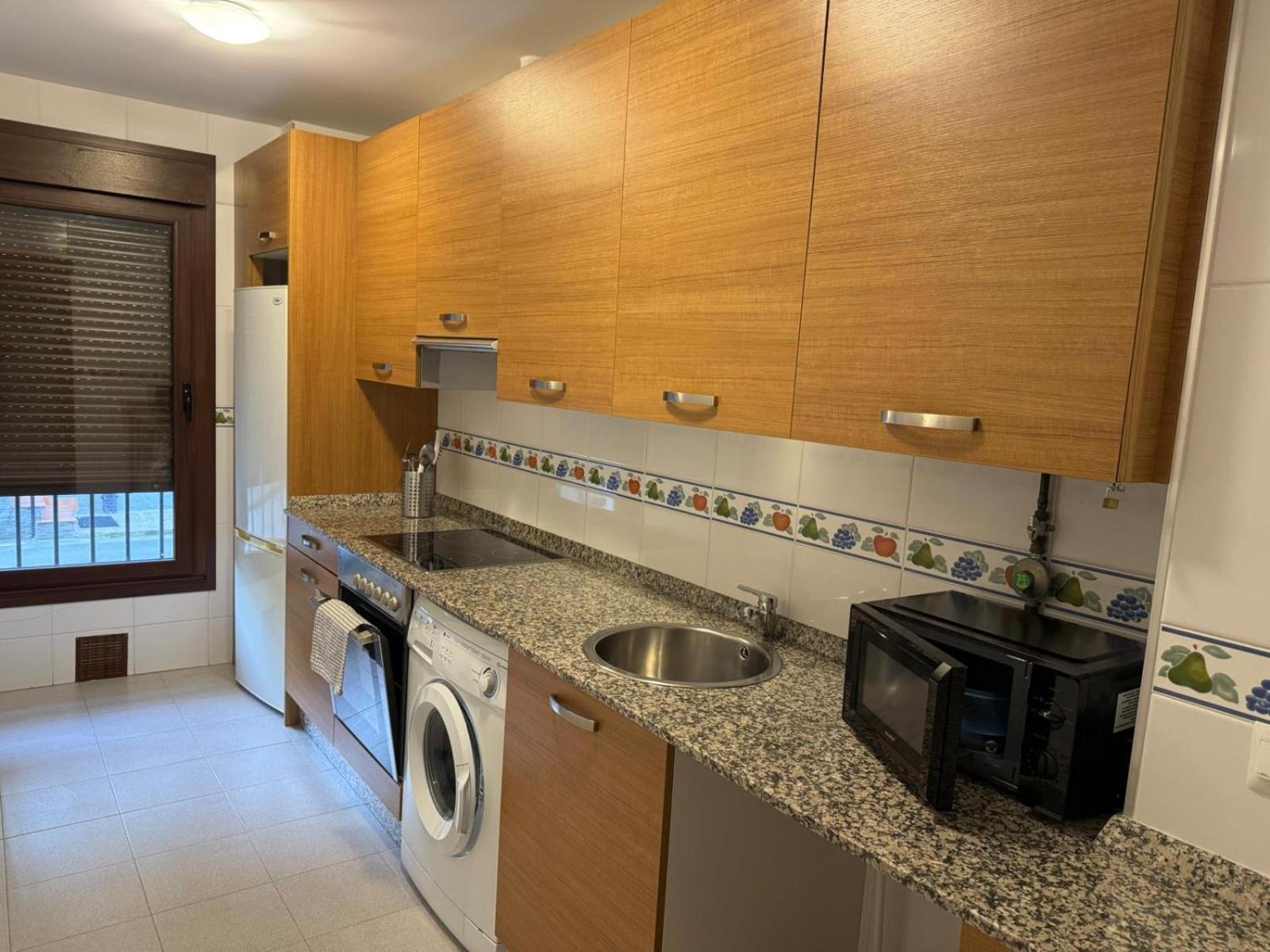 Apartamentos El Caxigu アレナス・デ・カブラレス エクステリア 写真