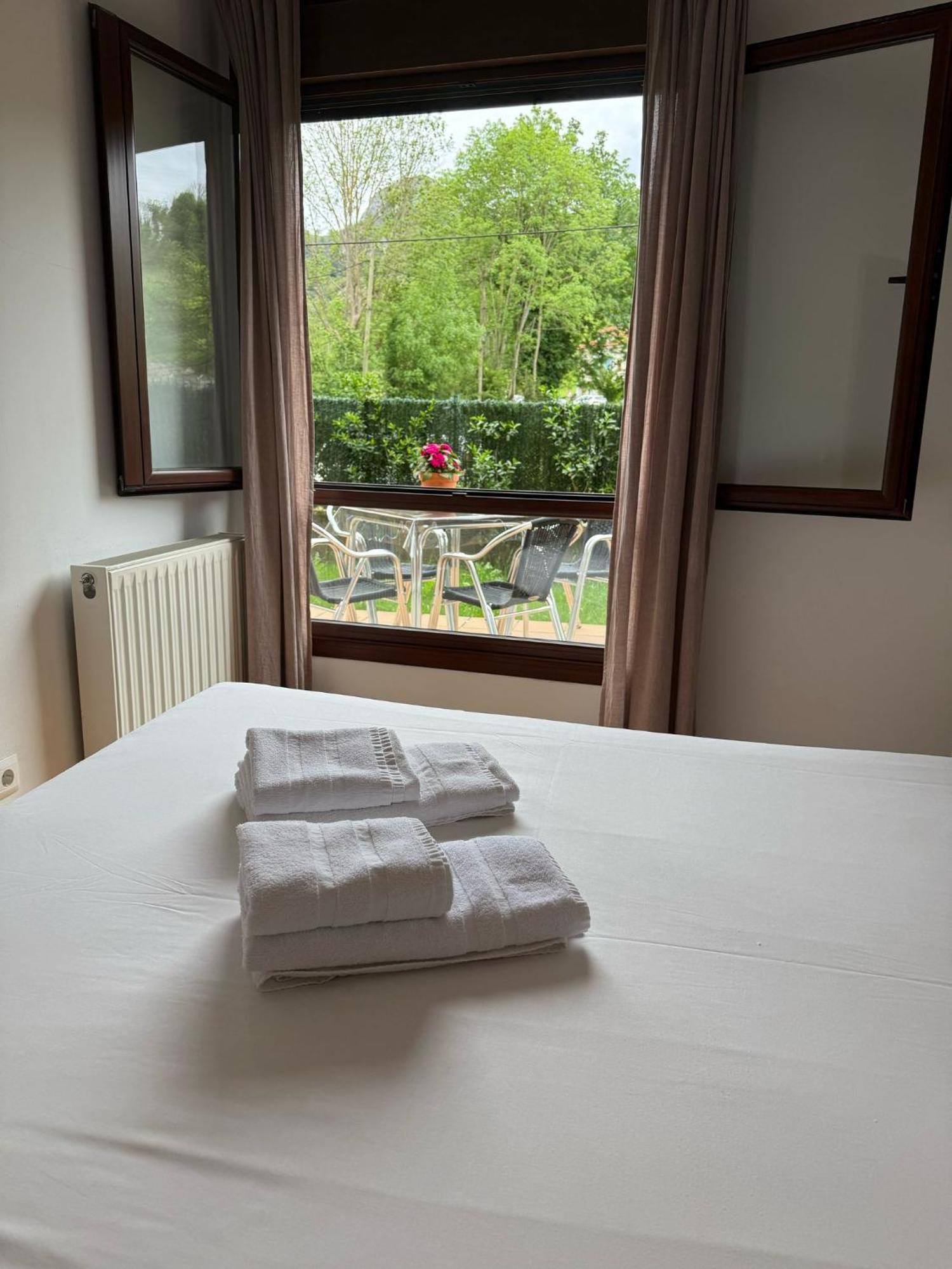 Apartamentos El Caxigu アレナス・デ・カブラレス エクステリア 写真