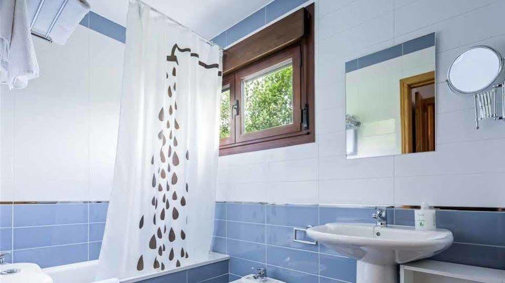 Apartamentos El Caxigu アレナス・デ・カブラレス エクステリア 写真