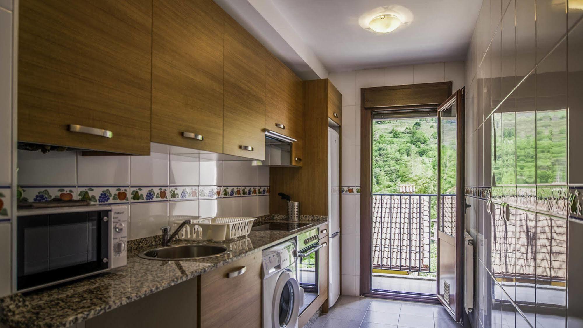 Apartamentos El Caxigu アレナス・デ・カブラレス エクステリア 写真
